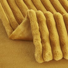 Chunky Embossed Faux Fur Throw
